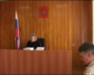 Из зала суда